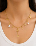 Elegant Gold Charm Necklace with Pearl & Key Charms