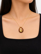 Elegant Gold-Tone Long Chain Necklace with Unique Teardrop Pendant